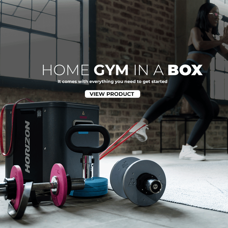Home gym equipment including weights and resistance bands with a person exercising in the background